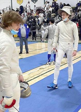Pope John fencer from Hamburg finishes fourth in state championships Allen Trudnos and Ben Giralt between matches (Photo provided)
