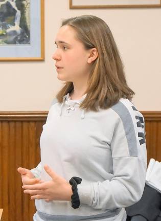 Isobel Costello discusses the Weekend Bag Program with the Ogdensburg Council, May 13
