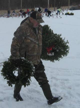 Group removes wreaths at season's end