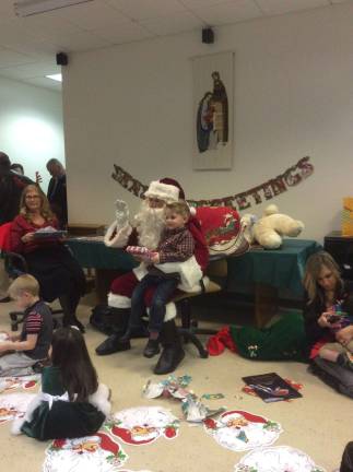 Santa visits Reverend Brown Preschoolers Photo taken from the visit Dec. 19 at Reverend Brown Preschool in Sparta.