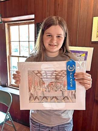 Ogdensburg art students honored Eighth-grader Cassidy Lairson, who won first place for her artwork, ‘The Cat Supper.’
