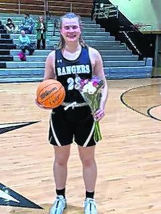 Schels breaks basketball scoring record