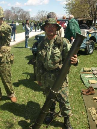 Military vehicles, troops occupy fairgrounds Photos by John Church John Barretta of Essex County, dressed in Vietnam War era equipment, with a 3.5 inch Super Bazooka.