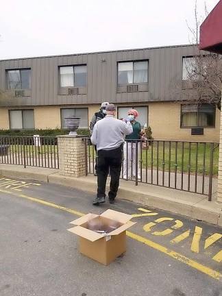 Members of the Andover Township Police Department on April 17 handed out face shields to employees of both Andover Subacute facilities. The shields were donated by resident Steven Minnick.