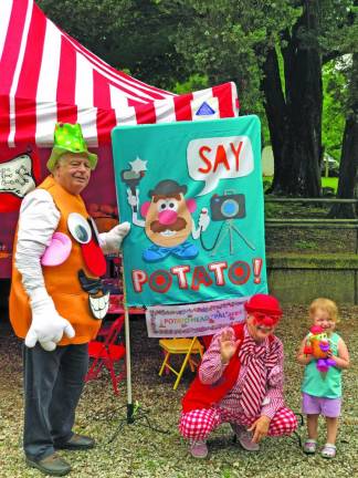 Mr. Potato Head and Craigles the Clown of God’s Funny Bones pose with Zoë Smith of Hewitt after she built her own Mr. Potato Head.