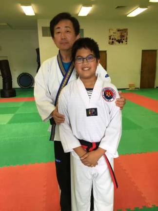 Nicholas Talon, age 12, of Sparta, has achieved the rank of junior black belt. Nicholas has been training for three years with Grandmaster Kim at the Universal Martial Arts Institute, Kim's Martial Arts, of Lafayette.