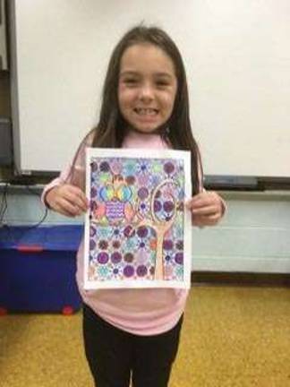 Breylin shows off her art work at Lafayette KEEP