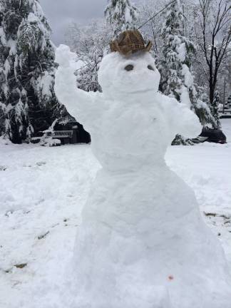 The Flanigan family built this snowman on Thanksgiving.