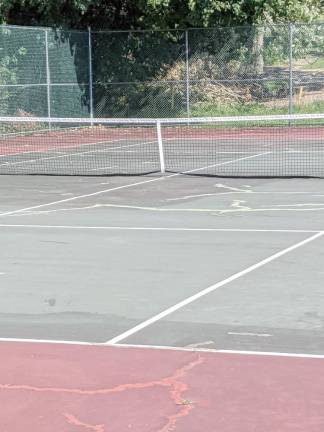 Merriam tennis court is playable once again The Merriam tennis court after repairs (Mary Rapuano)