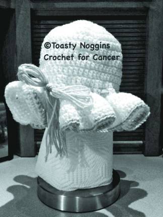 Woman warms heads, hearts with crochet Toasty Noggins Facebook page A bonnet.