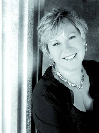 Weichert Realtors honors top associates Sally VanderGroef