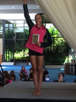 Local gymnast earns world championship Local gymnast earns world championship