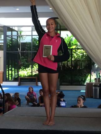 Local gymnast earns world championship