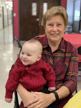 ‘I served my country’ Diane Crowley, retired Navy nurse commander, with grandson Dante (Photo provided)