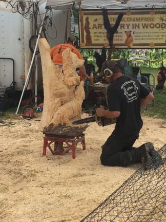Live wood carving with a chainsaw at the fair.