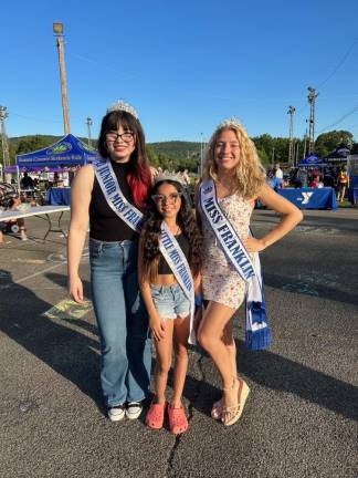 From left are Junior Miss Franklin Lily Parker, Little Miss Franklin Mia Sanchez and Miss Franklin Chrystine Mowles. Mia sang the National Anthem at the National Night Out event.