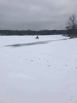 Ice fishing is a sport &#x2018;oft times enjoyed alone. (Photo by Laurie Gordon)