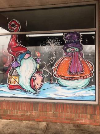 Artist celebrates decade of painting holiday spirit Kimberly Lonsky's art lights up Villa Capri's window in Sparta.