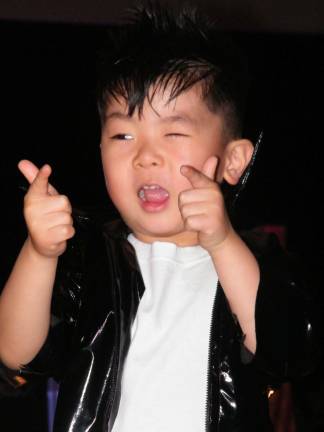 Vo-Tech holds second annual veterans tribute fashion show Photo by Viktoria-Leigh Wagner Matthew Ou, 4, of Hardyston poses for the audience during the fashion show on May 22.