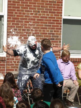 Pies on Pi Day Earl Hornyak of Ogdensburg, physical education teacher, tales a hit from Zak Duhaime