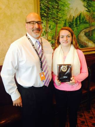 Emily MulVoy, the March Student of the Month for the Hampton Rotary is shown with Lafayette Township School Principal Gerard Fazio.