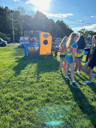 FN3 Franklin Borough Police Capt. Seamus Geddis sits in a dunk tank.