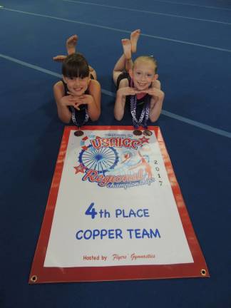 Local gymnasts win competitions From left, Rachael McKenna and Chelsea Smith