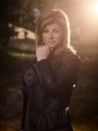 Kim Russo bridges the gap between the living and dead Photo provided Kim Russo, the Happy Medium, will appear at Newton Theatre on Sunday, Jan. 25 at 7 p.m.