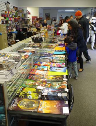 Children’s Reading Awareness Month includes free comic books Visitors look through the free comics that were available.