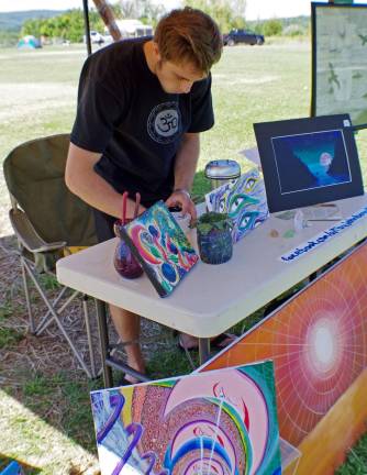 Hamburg business hosts wellness festival in Vernon Vernon artist John Bennett offered a wide selection of spiritual and mystic paintings.