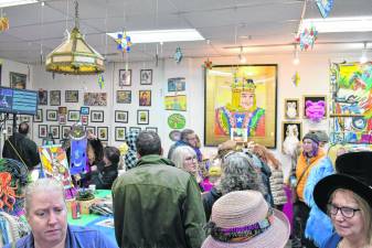 The Franklin Art Factory hosts the opening of an exhibit of artwork inspired by ‘Alice in Wonderland’ on Sunday, March 10. (Photos by Maria Kovic)