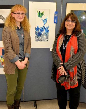 Vernon Township High School junior Aileen Bancroft, who won first place in drawing, is shown with her art teacher Patricia Soriano-Bunger.
