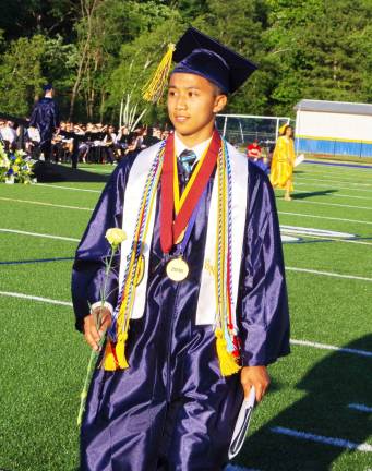 Jefferson sends off 2016 graduates Graduate Dakila Mina wearing his academic medals proudly.