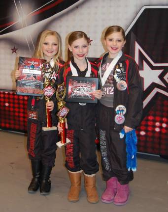 Ziegler Dance Centre succeeds at competition Ava Berner, Makayla Snyder & Sophia Van Leuven perform þÄúWord Up.þÄù