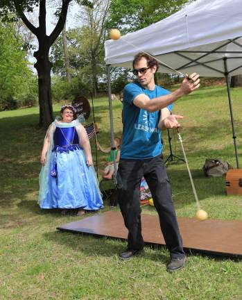 Jon Larsen spins balls at the Owiepalooza fundraiser on Saturday