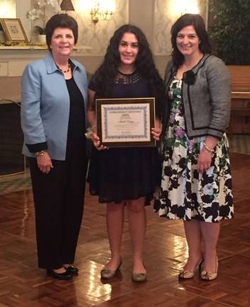 Superintendent Jennifer Cenatiempo and Dr. Rosalie Lamonte present the Superintendent Roundtable Award to Arielle Ortega from the Lafayette Township School District on April 28.