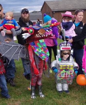 The Tobin family of Highland Lakes once again won top prizes for their original costumes created by their mother, Kerry, who also appears professionally as Pixie Pop the Clown. Sebastian, 3, won first place overall for his little robot costume and his brother Ozzie, 8, won second place overall for his dragon costume.