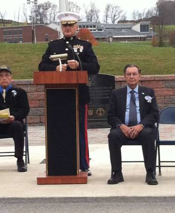 Photos by Laura Marchese Colonel Daniel Colfax speaks during the ceremony. For more photos, see Page 2.