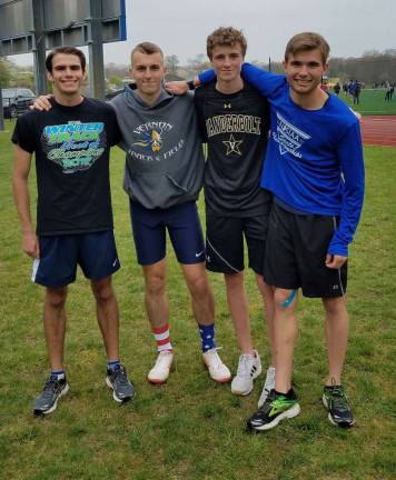Pictured from left to right: Senior Pat Weiss, Junior DJ McQuillan, Freshmen Chris Ruiz and Senior Bryan Forino. This group set a new school record in the Distance Medley with a time of 11:00.48 breaking a 20-year old school record. With a time like that, they will look to qualify for Nationals.