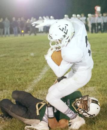 Wallkill Valley wide receiver Romeo Cuevas is tackled by Sussex Tech defensive back Austin Durham in the second half. Cuevas caught three passes resulting in 13 yards.