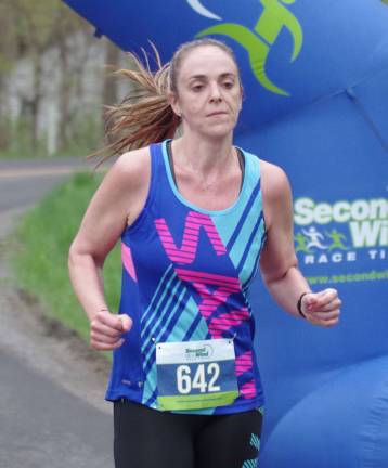 5K runner Meghan Radimer of Layton, N.J. finished in second place overall with a time of 23:35.44.