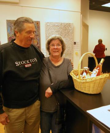 John R. and Lucia S. McMorris, proprietors of Blessed Acres Farm, donated a basket with a sampling of their products to help Father John's Animal House.
