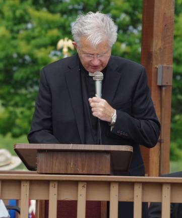 Monsignor John Boland offered the invocation and the benediction.