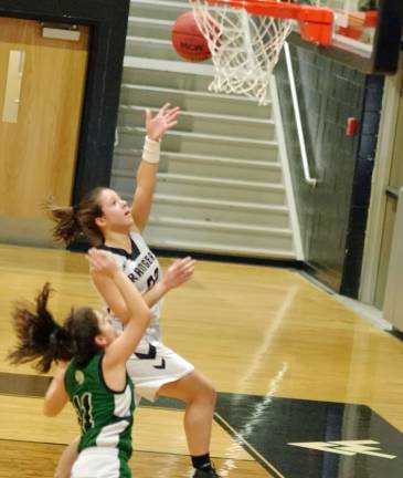 Wallkill Valley's Francesca Ciasullo tosses the ball towards the hoop during a shot.