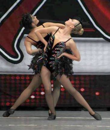 Dance Expression dancers succeed at competition Renea rossi and Morgan Parker are shown during their duet.
