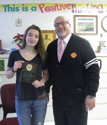 Nicole Tomlinson has been awarded the Hampton Rotary Student of the Month Award for December 2015. She is shown with Assistant Principal Jerry Fazzio.