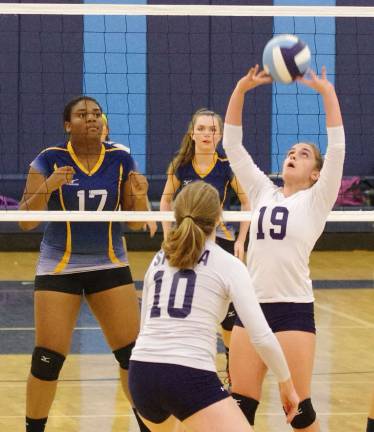 Sparta defeats Jefferson, 2-0, in volleyball Sparta's Talia Smith (19) performs a 'set' maneuver with the ball.