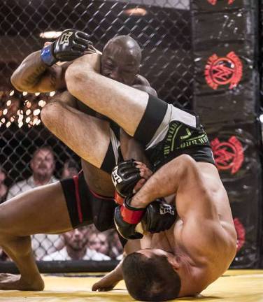 Local gym wins three championship fights Jim Fitzpatrick wins his Lightweight Title fight with an armbar.