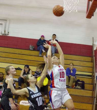 Lenape Valley's Danielle DeMasi tosses the ball towards the hoop.