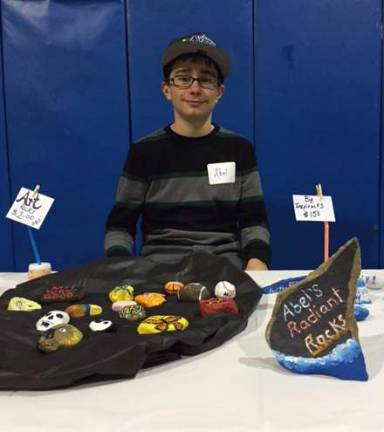 Sixth-grade student Fiona Cummings sells her homemade bath bombs.